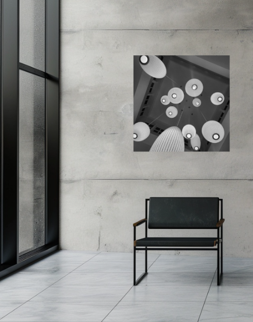A 30 × 30-inch black-and-white acrylic print displayed in a contemporary interior setting.