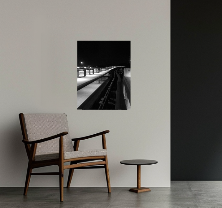 Black-and-white photograph taken from the terminal tram at Orlando International Airport in 2022, shown as a 24 × 36 in acrylic print in a contemporary interior.